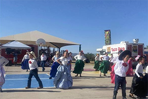 Students performing Folklórico dance