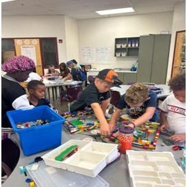 Students working with Legos